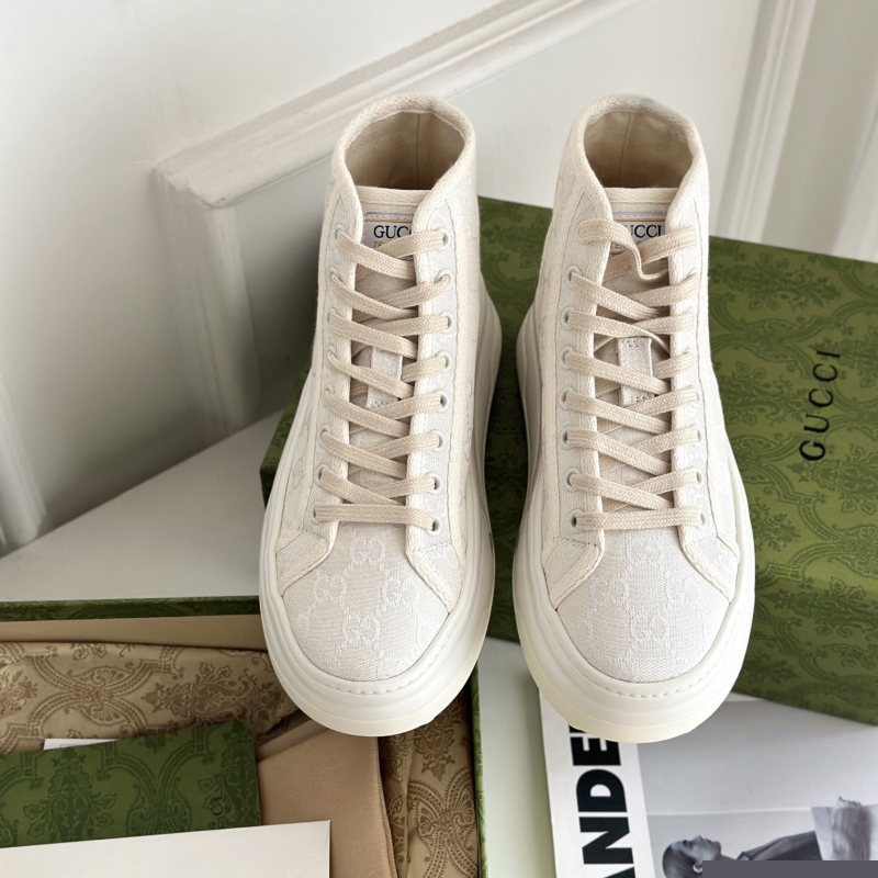 G*u*i sneakers
